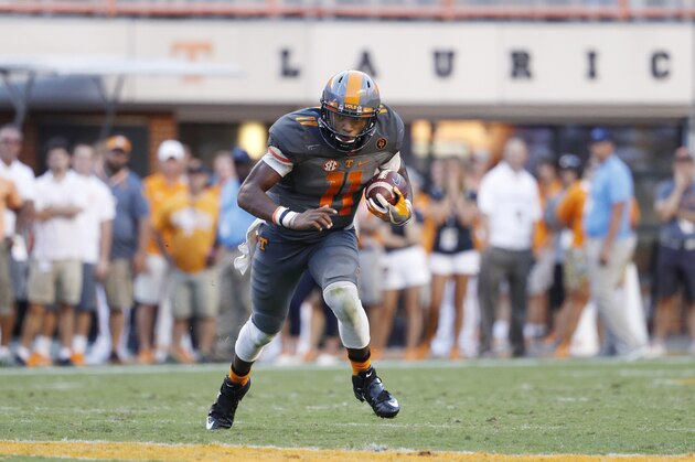 KNOXVILLE, TN - SEPTEMBER 24: Joshua Dobbs #11 of the Tennessee Volunteers runs with the ball against the Florida Gators during the game at Neyland Stadium on September 24, 2016 in Knoxville, Tennessee. Tennessee defeated Florida 38-28. (Photo by Joe Robbins/Getty Images)