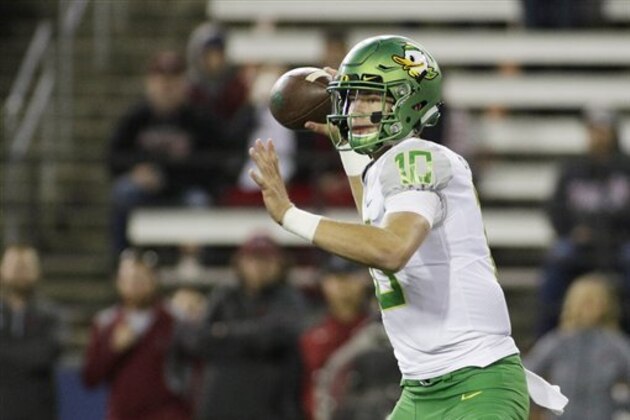 Oregon quarterback Justin Herbert (10) passes the ball during the second half of an NCAA college football game against Washington State in Pullman, Wash., Saturday, Oct. 1, 2016. (AP Photo/Young Kwak)