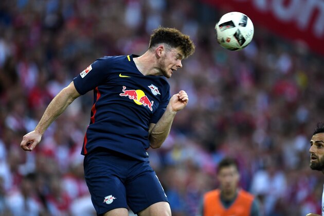 Leipzig´s midfielder Oliver Burke vies for the ball during the German first division Bundesliga football match of 1 FC Cologne vs RB Leipzig in Cologne, western Germany, on September 25, 2016. / AFP / PATRIK STOLLARZ / RESTRICTIONS: DURING MATCH TIME: DFL RULES TO LIMIT THE ONLINE USAGE TO 15 PICTURES PER MATCH AND FORBID IMAGE SEQUENCES TO SIMULATE VIDEO. == RESTRICTED TO EDITORIAL USE == FOR FURTHER QUERIES PLEASE CONTACT DFL DIRECTLY AT + 49 69 650050
        (Photo credit should read PATRIK STOLLARZ/AFP/Getty Images)