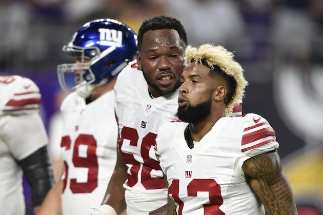 MINNEAPOLIS, MN - OCTOBER 3: Bobby Hart #68 of the New York Giants and teammate Odell Beckham #13 talk while walking off the field after the first half of the game against the Minnesota Vikings on October 3, 2016 at US Bank Stadium in Minneapolis, Minnesota. (Photo by Hannah Foslien/Getty Images)