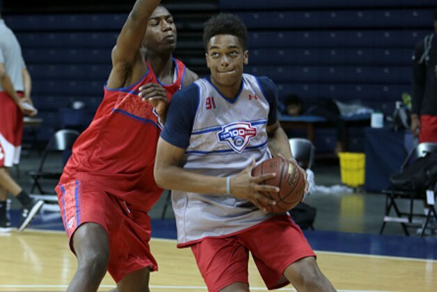 CHARLOTTESVILLE, VA - JUNE 19: PJ Washington #91 in white drives to the basket during the NBPA Top 100 Camp on June 19, 2015 at John Paul Jones Arena in Charlottesville, Virginia. (Photo by Kelly Kline/Getty Images)