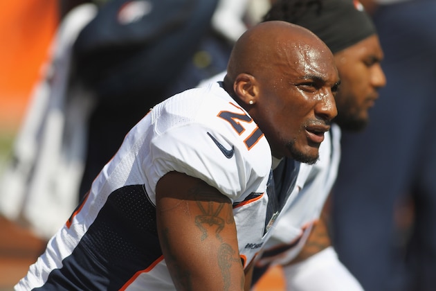 CINCINNATI, OH - SEPTEMBER 25:  Aqib Talib #21 of the Denver Broncos watches his team warm up before the game against the Cincinnati Bengals at Paul Brown Stadium on September 25, 2016 in Cincinnati, Ohio.The Broncos defeated the Bengals 29-17.  (Photo by John Grieshop/Getty Images)