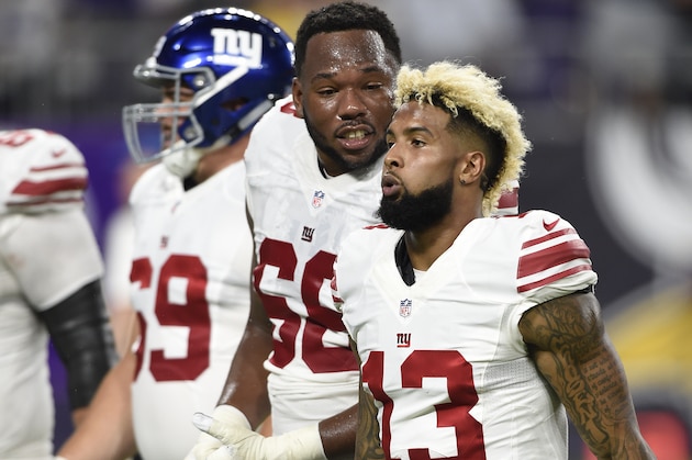 MINNEAPOLIS, MN - OCTOBER 3: Bobby Hart #68 of the New York Giants and teammate Odell Beckham #13 talk while walking off the field after the first half of the game against the Minnesota Vikings on October 3, 2016 at US Bank Stadium in Minneapolis, Minnesota. (Photo by Hannah Foslien/Getty Images)