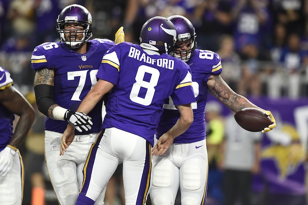 MINNEAPOLIS, MN - OCTOBER 3: Kyle Rudolph #82 of the Minnesota Vikings, and quarterback Sam Bradford #8, celebrate a touchdown in the second quarter of the game against the New York Giants on October 3, 2016 at US Bank Stadium in Minneapolis, Minnesota. (Photo by Hannah Foslien/Getty Images)