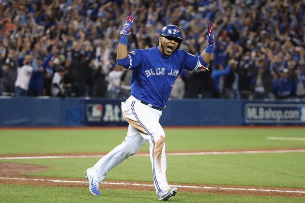 TORONTO, ON - OCTOBER 04:  Edwin Encarnacion #10 of the Toronto Blue Jays reacts after hitting a three-run walk-off home run in the eleventh inning to defeat the Baltimore Orioles 5-2 in the American League Wild Card game at Rogers Centre on October 4, 2016 in Toronto, Canada.  (Photo by Tom Szczerbowski/Getty Images)