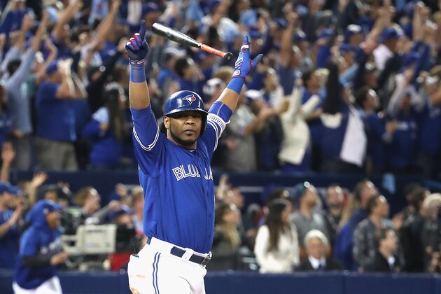 TORONTO, ON - OCTOBER 04:  Edwin Encarnacion #10 of the Toronto Blue Jays reacts after hitting a three-run walk-off home run in the eleventh inning to defeat the Baltimore Orioles 5-2 in the American League Wild Card game at Rogers Centre on October 4, 2016 in Toronto, Canada.  (Photo by Tom Szczerbowski/Getty Images)