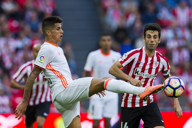 BILBAO, SPAIN - SEPTEMBER 18:  Joao Cancelo of Valencia CF competes for the ball with Markel Susaeta of Athletic Club  during the La Liga match between Athletic Club Bilbao and Valencia CF at San Mames Stadium on September 18, 2016 in Bilbao, Spain.  (Photo by Juan Manuel Serrano Arce/Getty Images)
