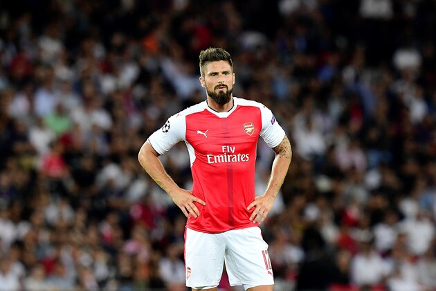 Arsenal's French striker Olivier Giroud reacts during the UEFA Champions League Group A football match between Paris-Saint-Germain vs Arsenal FC, on September 13, 2016 at the Parc des Princes stadium in Paris.  / AFP / FRANCK FIFE        (Photo credit should read FRANCK FIFE/AFP/Getty Images)