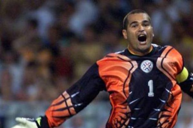 Paraguay's goalkeeper Jose Luis Chilavert jubilates after the third goal of his team against Nigeria  during the Nigeria v Paraguay, Group D, World Cup 98, soccer match at the Stadium Municipal in Toulouse on Wednesday, June 24, 1998. The other teams in Group D are Spain and Bulgaria. Paraguay won 3-1.  (AP Photo/Ricardo Mazalan)