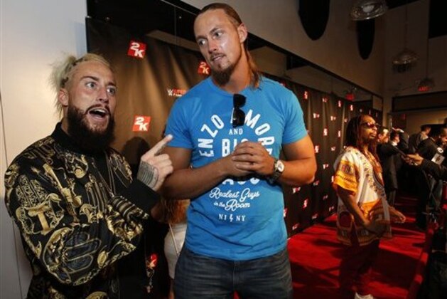 IMAGE DISTRIBUTED FOR 2K - WWE Superstars Enzo and Cass, right, are seen at the WWE 2K17 SummerSlam Kickoff Event in New York, on Friday, Aug. 19, 2016. (Adam Hunger/AP Images for 2K)