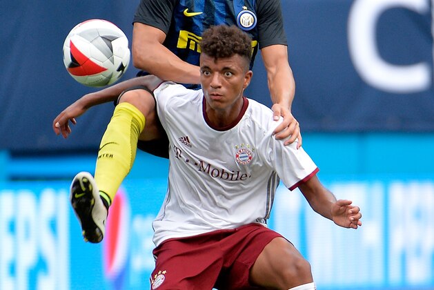 CHARLOTTE, NC - JULY 30:  Danilo D'Ambrosio #33 of FC Internazionale challenges Timothy Tillman #16 of FC Bayern Munich for the ball during an International Champions Cup match at Bank of America Stadium on July 30, 2016 in Charlotte, North Carolina. FC Bayern Munich defeated FC Internazionale, 4-1.  (Photo by Grant Halverson/Getty Images)