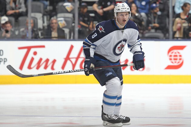 TORONTO, ON - NOVEMBER 4:  Jacob Trouba #8 of the Winnipeg Jets skates against the Toronto Maple Leafs during an NHL game at the Air Canada Centre on November 4, 2015 in Toronto, Ontario, Canada. The Jets defeated the Maple Leafs 4-2. (Photo by Claus Andersen/Getty Images)
