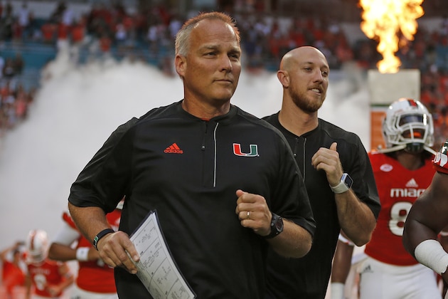 MIAMI GARDENS, FL - SEPTEMBER 3: Head coach Mark Richt of the Miami Hurricanes runs onto the field for the game against the Florida A&M Rattlers on September 3, 2016 at Hard Rock Stadium in Miami Gardens, Florida. The Hurricanes defeated the Rattlers 70-3. (Photo by Joel Auerbach/Getty Images)