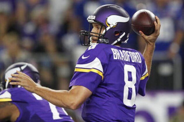 Minnesota Vikings quarterback Sam Bradford throws a pass during the first half of an NFL football game against the New York Giants on Monday, Oct. 3, 2016, in Minneapolis. (AP Photo/Andy Clayton-King)
