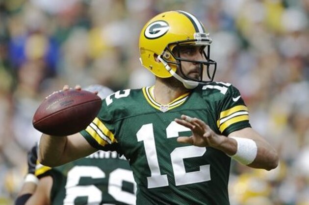 Green Bay Packers' Aaron Rodgers throws during the first half of an NFL football game against the Detroit Lions Sunday, Sept. 25, 2016, in Green Bay, Wis. (AP Photo/Jeffrey Phelps)