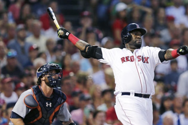 FILE - In this July 26, 2016, file photo, Boston Red Sox designated hitter David Ortiz and Detroit Tigers catcher Jarrod Saltalamacchia watch the flight of Ortiz's three-run home run during the third inning of a baseball game at Fenway Park, in Boston. Big Papi, Kris Bryant and Bryce Harper are just a few of the big-name offensive stars leading their teams into the postseason. (AP Photo/Charles Krupa, File)