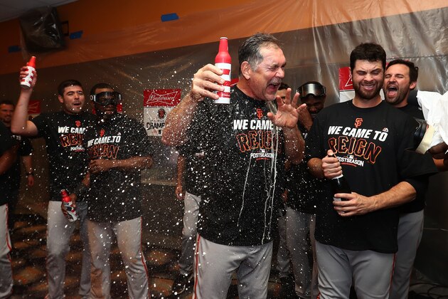 NEW YORK, NY - OCTOBER 05:  Bruce Bochy #15 of the San Francisco Giants celebrates their 3-0 victory over the New York Mets in the locker room after their National League Wild Card game at Citi Field on October 5, 2016 in New York City.  (Photo by Al Bello/Getty Images)