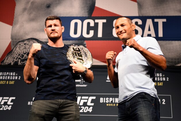 LAS VEGAS, NV - AUGUST 19:  (L-R) UFC middleweight champion Michael Bisping and Dan Henderson face off for fans and media during the UFC 204 press conference at the MGM Grand Hotel & Casino on August 19, 2016 in Las Vegas, Nevada. (Photo by Jeff Bottari/Zuffa LLC/Zuffa LLC via Getty Images)
