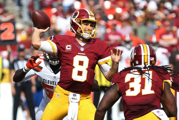 Oct 2, 2016; Landover, MD, USA; Washington Redskins quarterback Kirk Cousins (8) throws the ball as Cleveland Browns linebacker Cam Johnson (57) chases in the third quarter at FedEx Field. The Redskins won 31-20. Mandatory Credit: Geoff Burke-USA TODAY Sports