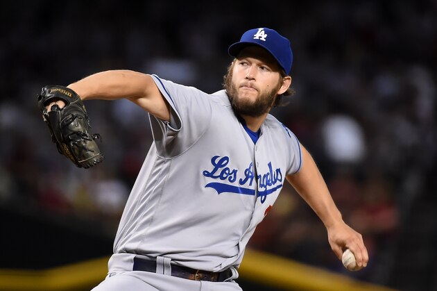 PHOENIX, AZ - JUNE 15:  Clayton Kershaw #22 of the Los Angeles Dodgers delivers a first inning pitch against the Arizona Diamondbacks at Chase Field on June 15, 2016 in Phoenix, Arizona.  (Photo by Norm Hall/Getty Images)
