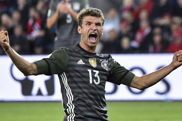 Germany's midfielder Thomas Mueller celebrates after scoring the 0-3 goal during the World Cup 2018 football qualification match between Norway and Germany in Oslo on September 4, 2016. / AFP / John MACDOUGALL        (Photo credit should read JOHN MACDOUGALL/AFP/Getty Images)