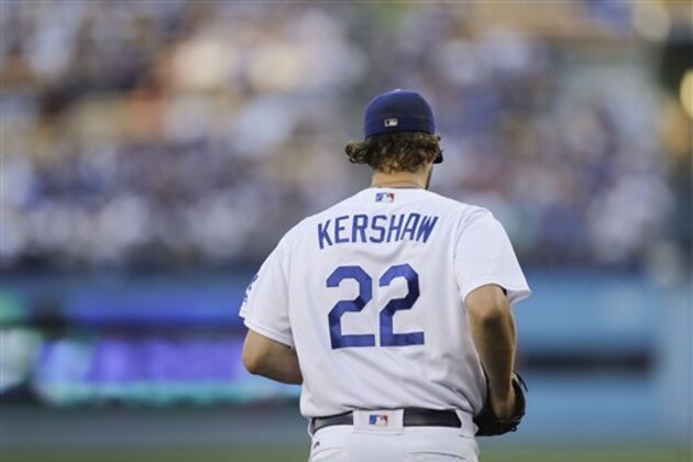 Los Angeles Dodgers starting pitcher Clayton Kershaw walks toward the mound to throw against the Colorado Rockies during the first inning of a baseball game, Saturday, Sept. 24, 2016, in Los Angeles. (AP Photo/Jae C. Hong)