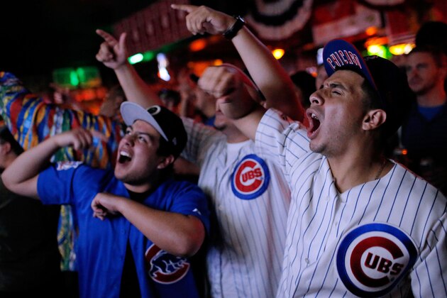 CHICAGO, IL - OCTOBER 07: Brandon Oliceron (R) of Chicago react after Jake Arrieta #49 of the Chicago Cubs (not pictured) was hit by a pitch and the benches cleared during the seventh inning of the National League Wild Card Game between the Chicago Cubs and Pittsburgh Pirates, at Sluggers World Class Sports Bar on October 7, 2015 in Chicago, Illinois.  (Photo by Jon Durr/Getty Images)