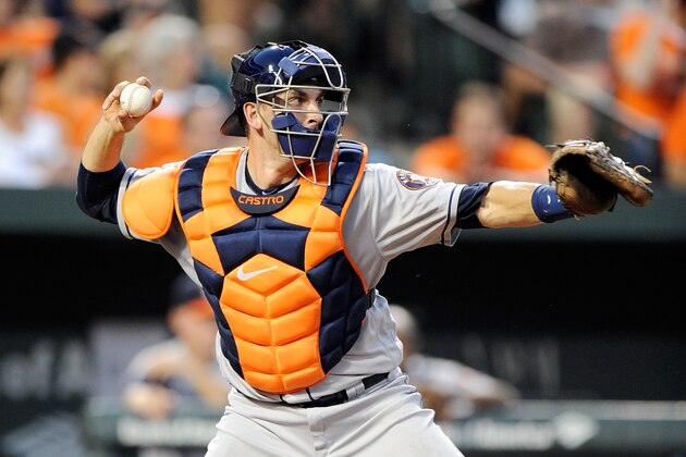 BALTIMORE, MD - AUGUST 18:  Jason Castro #15 of the Houston Astros throws the ball to second base against the Baltimore Orioles at Oriole Park at Camden Yards on August 18, 2016 in Baltimore, Maryland.  (Photo by G Fiume/Getty Images)