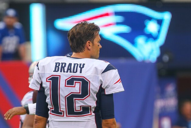 Sep 1, 2016; East Rutherford, NJ, USA; New England Patriots quarterback Tom Brady (12) looks on during warmups prior to the game against the New York Giants at MetLife Stadium. Mandatory Credit: Ed Mulholland-USA TODAY Sports
