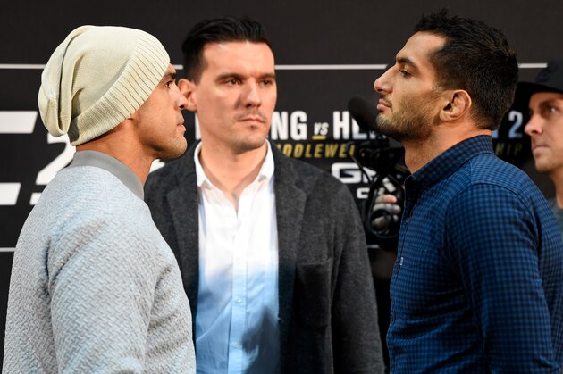 MANCHESTER, ENGLAND - OCTOBER 06:   (L-R) Opponents Vitor Belfort of Brazil and Gegard Mousasi of The Netherlands face off during the UFC 204 Ultimate Media Day at Manchester Central on October 6, 2016 in Manchester, England. (Photo by Josh Hedges/Zuffa LLC/Zuffa LLC via Getty Images)