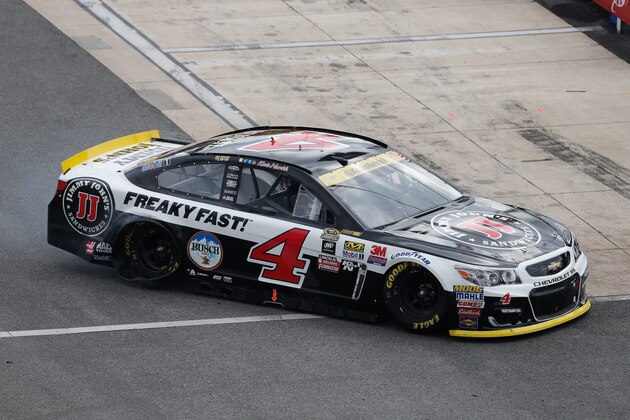 DOVER, DE - OCTOBER 02:  Kevin Harvick, driver of the #4 Jimmy John's Chevrolet, drives to the garage area during the NASCAR Sprint Cup Series Citizen Solider 400 at Dover International Speedway on October 2, 2016 in Dover, Delaware.  (Photo by Brian Lawdermilk/Getty Images)