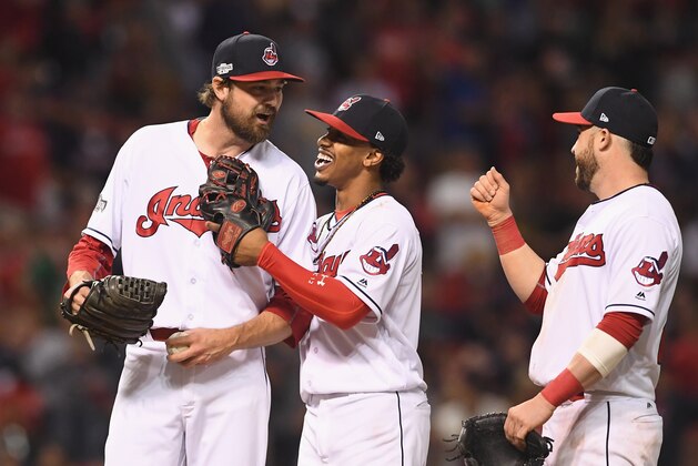 CLEVELAND, OH - OCTOBER 06:  Andrew Miller #24 of the Cleveland Indians reacts with Francisco Lindor #12 and Jason Kipnis #22 in the seventh inning against the Boston Red Sox during game one of the American League Divison Series at Progressive Field on October 6, 2016 in Cleveland, Ohio.  (Photo by Jason Miller/Getty Images)