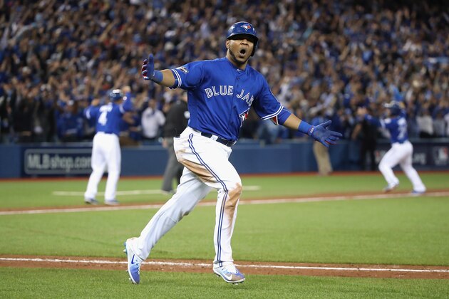 TORONTO, ON - OCTOBER 04:  Edwin Encarnacion #10 of the Toronto Blue Jays reacts after hitting a three-run walk-off home run in the eleventh inning to defeat the Baltimore Orioles 5-2 in the American League Wild Card game at Rogers Centre on October 4, 2016 in Toronto, Canada.  (Photo by Tom Szczerbowski/Getty Images)