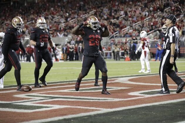 San Francisco 49ers running back Carlos Hyde (28) celebrates after running for a touchdown against the Arizona Cardinals during the second half of an NFL football game in Santa Clara, Calif., Thursday, Oct. 6, 2016. (AP Photo/Marcio Jose Sanchez)