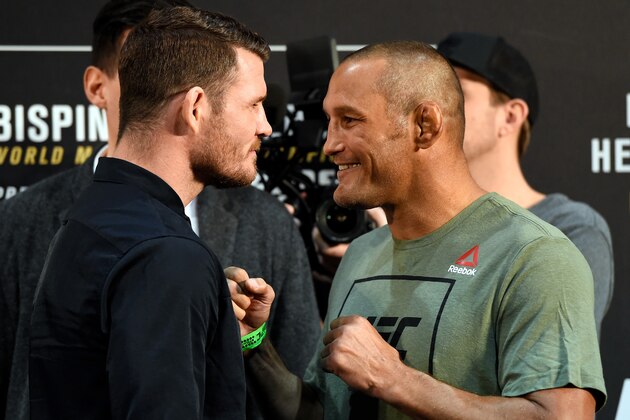 MANCHESTER, ENGLAND - OCTOBER 06:   (L-R) Opponents Michael Bisping of England and Dan Henderson face off during the UFC 204 Ultimate Media Day at Manchester Central on October 6, 2016 in Manchester, England. (Photo by Josh Hedges/Zuffa LLC/Zuffa LLC via Getty Images)