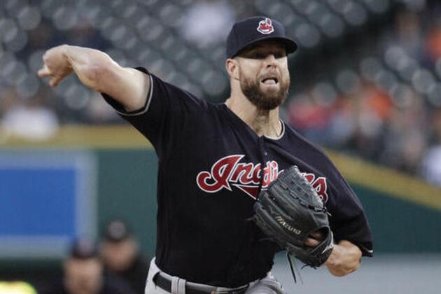 Cleveland Indians pitcher Corey Kluber throws against the Detroit Tigers during the first inning of a baseball game in Detroit, Monday, Sept. 26, 2016. (AP Photo/Paul Sancya)