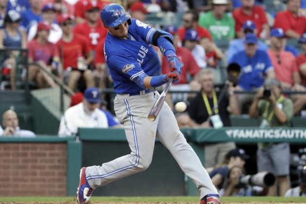 Toronto Blue Jays' Troy Tulowitzki singles to right during the fifth inning against the Texas Rangers in Game 1 of baseball's American League Division Series, Thursday, Oct. 6, 2016, in Arlington, Texas. (AP Photo/David J. Phillip)