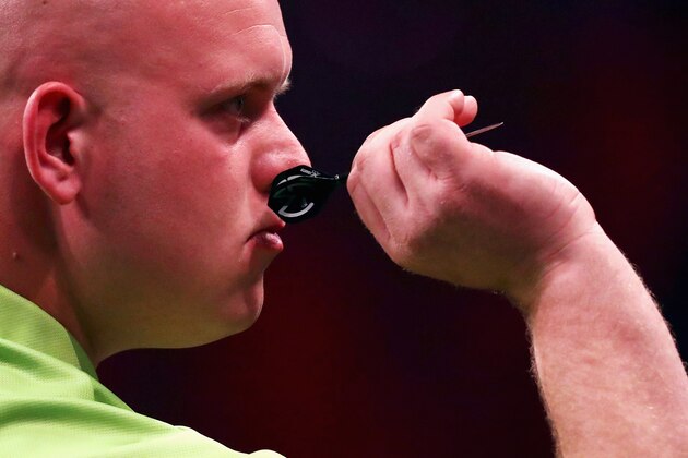 ROTTERDAM, NETHERLANDS - MAY 12:  Michael van Gerwen of the Netherlands plays a shot in his match against Phil 'The Power' Taylor of England during the Darts Betway Premier League Night 15 at Rotterdam Ahoy on May 12, 2016 in Rotterdam, .  (Photo by Dean Mouhtaropoulos/Getty Images)