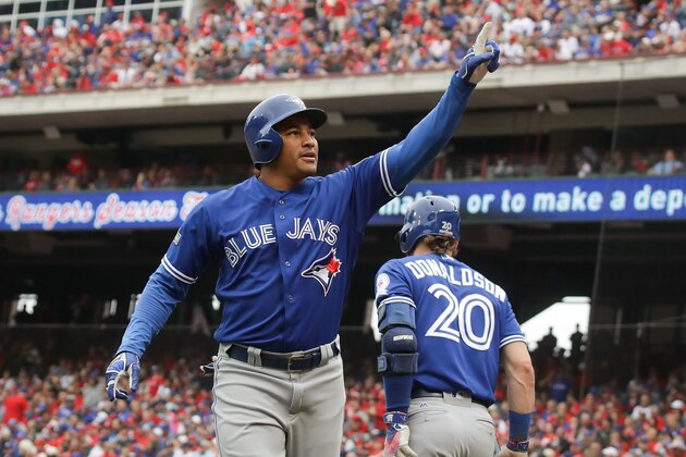 ARLINGTON, TX - OCTOBER 07:  Ezequiel Carrera #3 of the Toronto Blue Jays celebrates after hitting a solo home run against the Texas Rangers in the fifth inning of game two of the American League Divison Series at Globe Life Park in Arlington on October 7, 2016 in Arlington, Texas.  (Photo by Ronald Martinez/Getty Images)