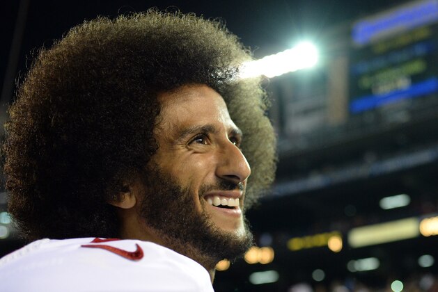 Sep 1, 2016; San Diego, CA, USA;  San Francisco 49ers quarterback Colin Kaepernick (7) smiles as he looks into the stands after the game against the San Diego Chargers at Qualcomm Stadium. Mandatory Credit: Jake Roth-USA TODAY Sports