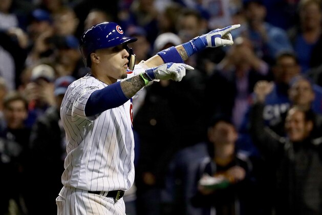 CHICAGO, ILLINOIS - OCTOBER 07:  Javier Baez #9 of the Chicago Cubs celebrates after hitting a home run in the eighth inning against the San Francisco Giants at Wrigley Field on October 7, 2016 in Chicago, Illinois.  (Photo by Jonathan Daniel/Getty Images)