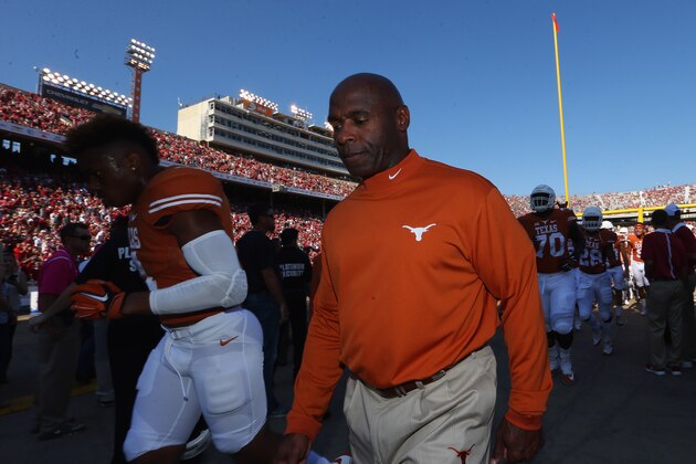 DALLAS, TX - OCTOBER 10:  Head coach Charlie Strong of the Texas Longhorns walks off the field before the 2015 AT&T Red River Showdown at Cotton Bowl on October 10, 2015 in Dallas, Texas.  (Photo by Ronald Martinez/Getty Images)