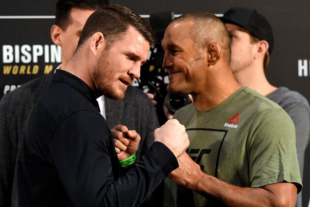 MANCHESTER, ENGLAND - OCTOBER 06:   (L-R) Opponents Michael Bisping of England and Dan Henderson face off during the UFC 204 Ultimate Media Day at Manchester Central on October 6, 2016 in Manchester, England. (Photo by Josh Hedges/Zuffa LLC/Zuffa LLC via Getty Images)