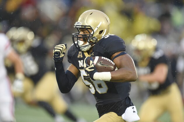ANNAPOLIS, MD - OCTOBER 08:  Josiah Powell #48 of the Navy Midshipmen runs back an interception for a touchdown in the third quarter during a football game against the Houston Cougars at Navy-Marines Memorial Stadium on October 8, 2016 in Annapolis, Maryland.  (Photo by Mitchell Layton/Getty Images)