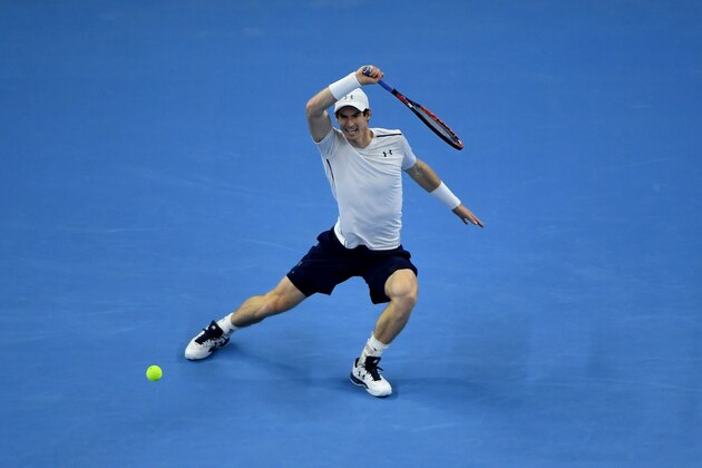 Andy Murray of Britain hits a return against Grigor Dimitrov of Bulgaria during the men's singles final at the China Open tennis tournament in Beijing on October 9, 2016. / AFP / WANG ZHAO        (Photo credit should read WANG ZHAO/AFP/Getty Images)