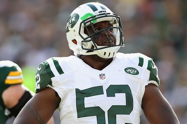 GREEN BAY, WI - SEPTEMBER 14:  Inside linebacker David Harris #52 of the New York Jets during the NFL game against the Green Bay Packers at Lambeau Field on September 14, 2014 in Green Bay, Wisconsin.  The Packers defeated the Jets 31-24.  (Photo by Christian Petersen/Getty Images)