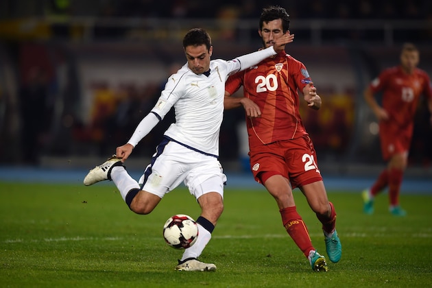 Italy's midfielder Giacomo Bonaventura (L) vies with Macedonia's midfielder Stefan Spirovski (R) during the FIFA World Cup 2018 qualifying football match between Macedonia and Italy on October 9, 2016 at Philip II of Macedon stadium in Skopje. / AFP / DIMITAR DILKOFF        (Photo credit should read DIMITAR DILKOFF/AFP/Getty Images)