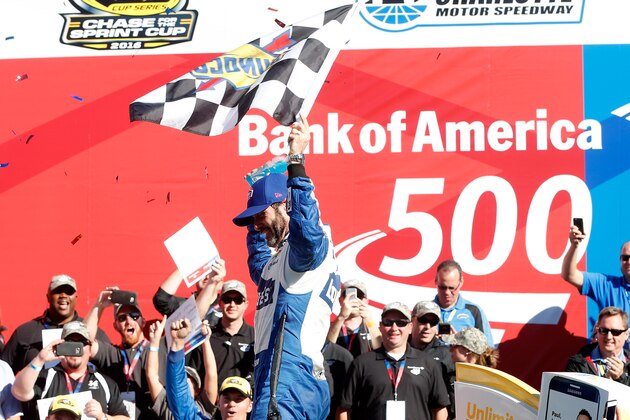 CHARLOTTE, NC - OCTOBER 09:  Jimmie Johnson celebrates in victory lane after winning the NASCAR Sprint Cup Series Bank of America 500 at Charlotte Motor Speedway on October 9, 2016 in Charlotte, North Carolina.  (Photo by Brian Lawdermilk/Getty Images)