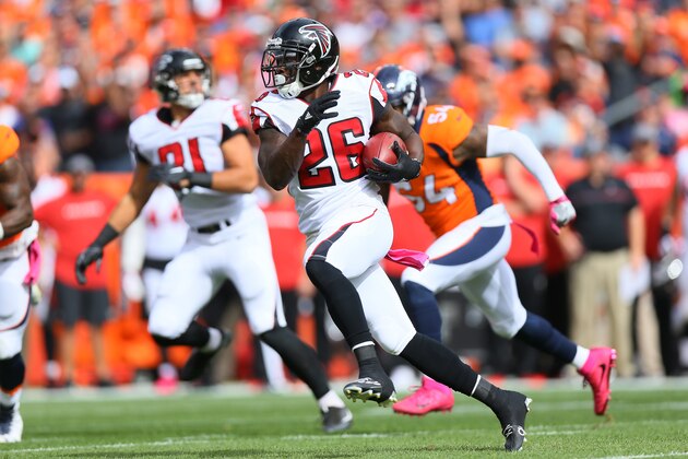 DENVER, CO - OCTOBER 9:  Running back Tevin Coleman #26 of the Atlanta Falcons runs with the ball in the first quarter of the game against the Denver Broncos at Sports Authority Field at Mile High on October 9, 2016 in Denver, Colorado. (Photo by Justin Edmonds/Getty Images)
