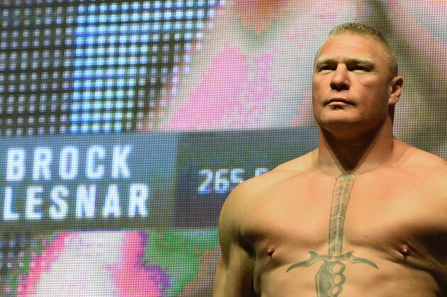 LAS VEGAS, NV - JULY 08:  Mixed martial artist Brock Lesnar poses on the scale during his weigh-in for UFC 200 at T-Mobile Arena on July 8, 2016 in Las Vegas, Nevada. Lesnar will meet Mark Hunt in a heavyweight bout on July 9 at T-Mobile Arena.  (Photo by Ethan Miller/Getty Images)